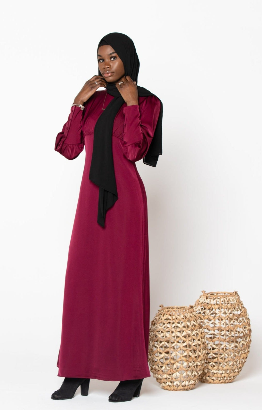 Burgundy long sleeve maxi dress paired with black hijab for stylish modest fashion