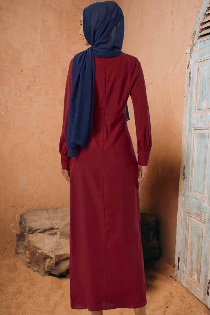 Burgundy long-sleeved Maroon Wrap Maxi Dress with navy hijab and criss cross neckline