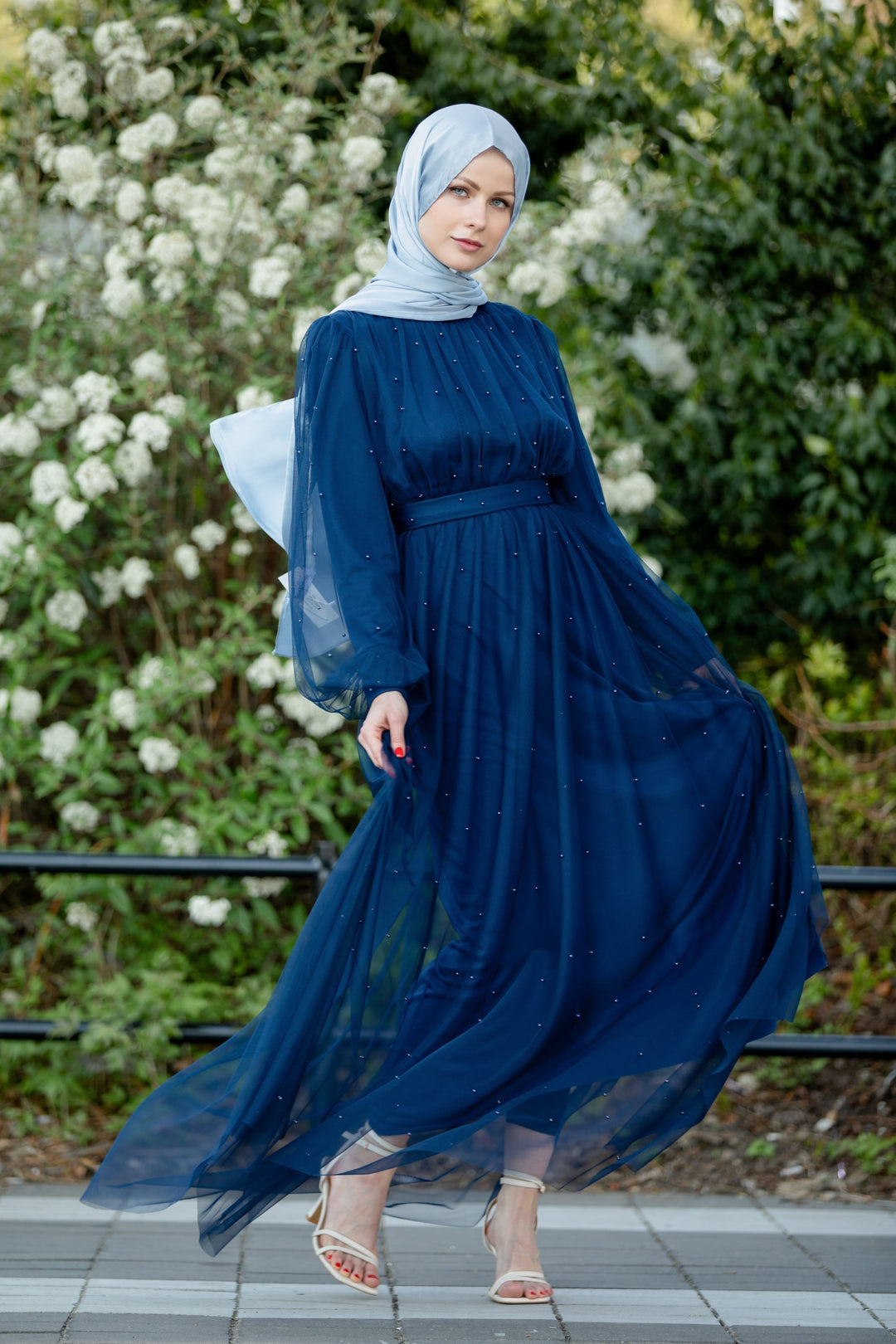 Elegant blue beaded chiffon dress from the Mesh Pearl Long Sleeve Gown collection