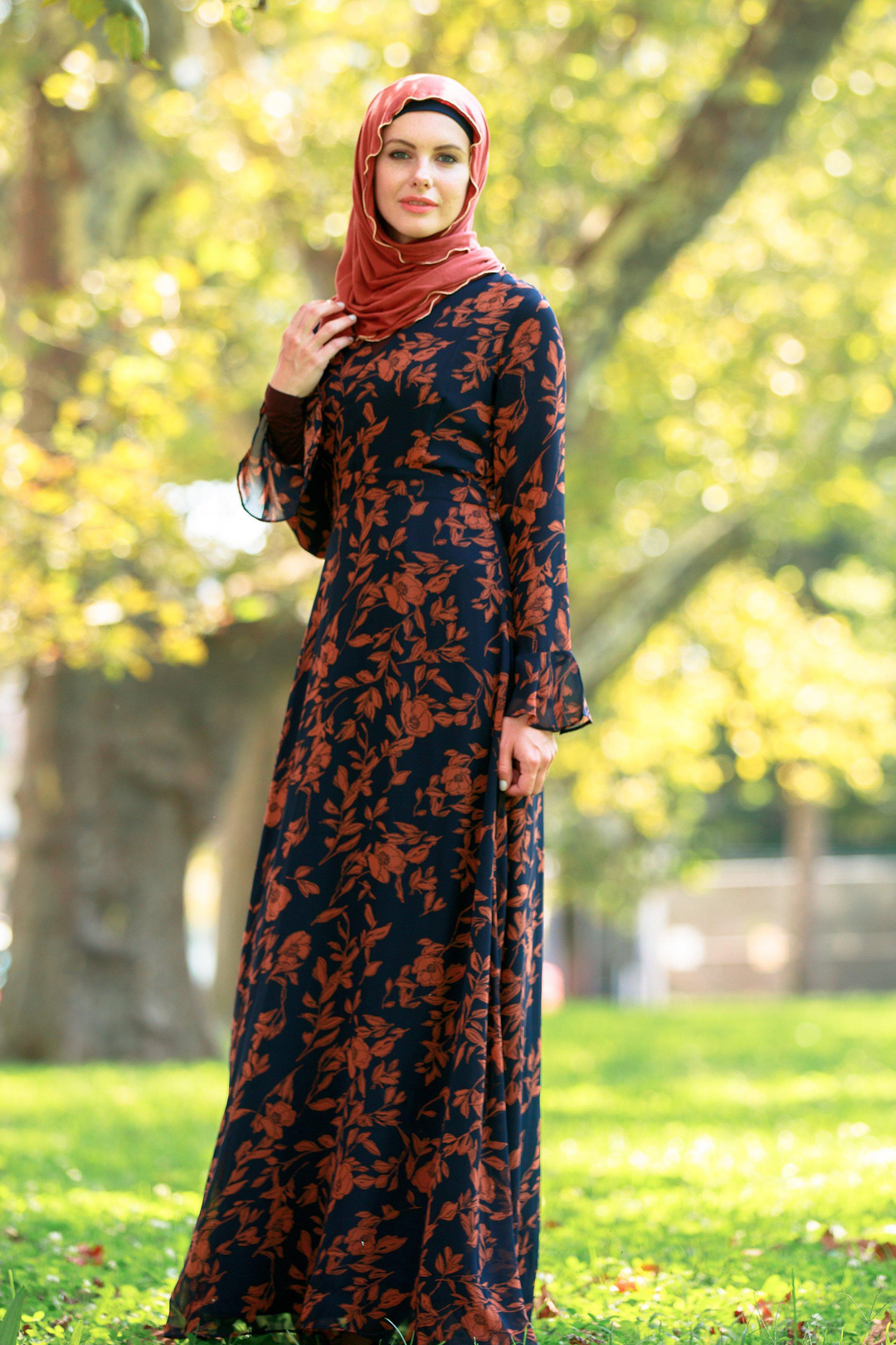 Navy and Caramel Flutter Long Sleeve Maxi Dress featuring a floral print design