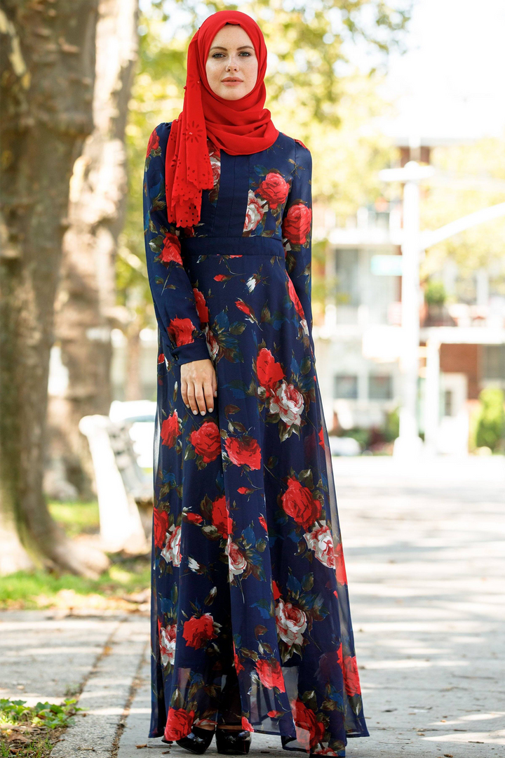 Floral long-sleeved maxi dress paired with a red hijab for urban modesty styling