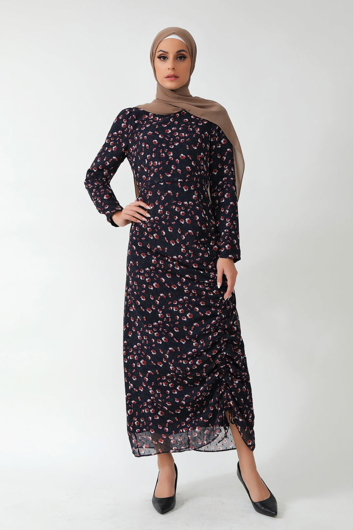 Navy Floral Ruched Maxi Dress featuring adjustable ruching and a vibrant floral print