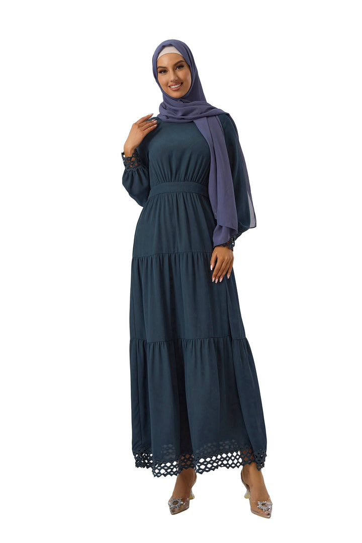 Woman wearing a Navy Lace Tiered Maxi Dress with hijab and long sleeves