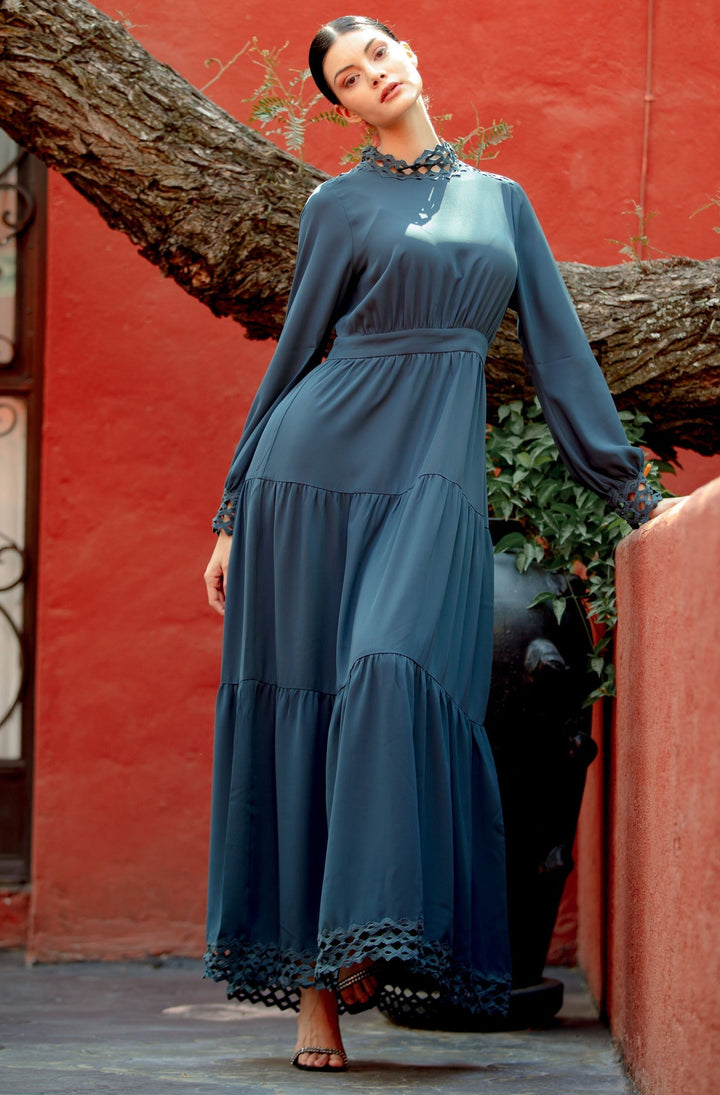 Long-sleeved Navy Lace Tiered Maxi Dress with a half turtle neckline and tiered design