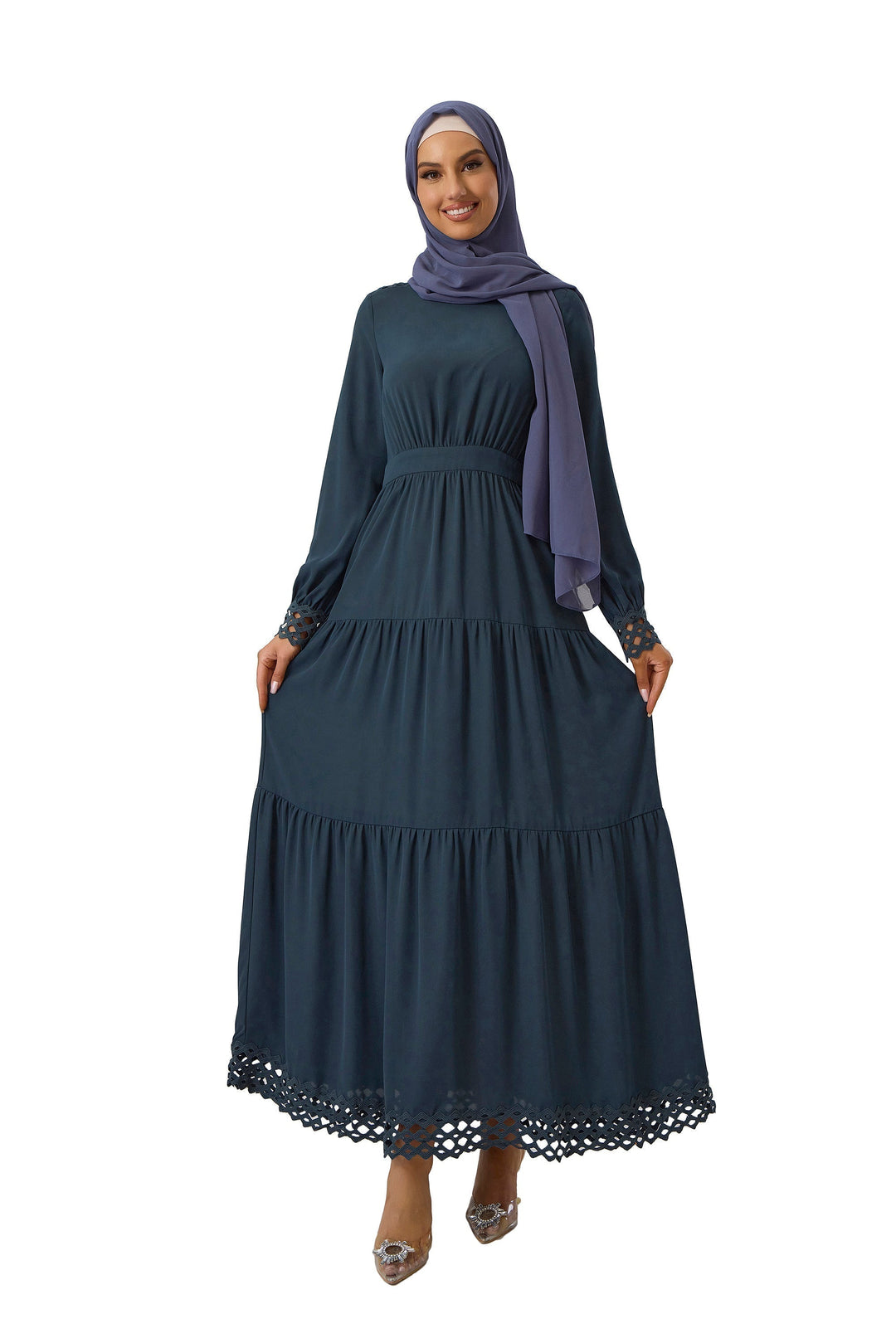 Woman in a Navy Lace Tiered Maxi Dress with long sleeves and hijab