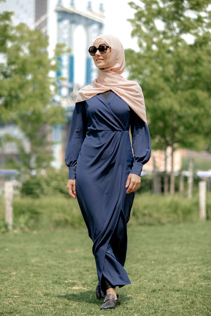 Woman in Navy Wrap Maxi Dress with Criss Cross Neckline and Hijab on Clearance