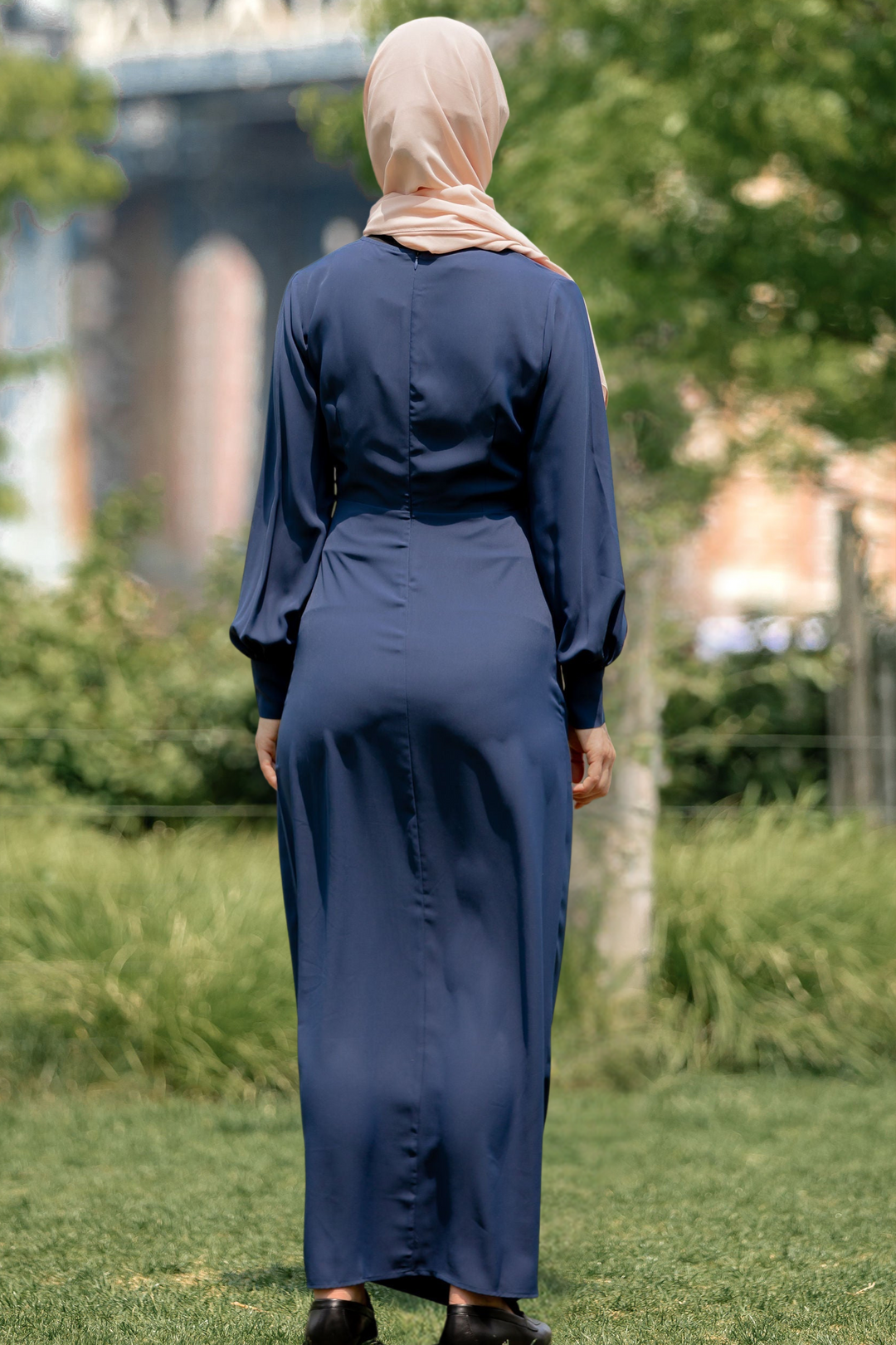 Navy blue wrap maxi dress with criss cross neckline and hijab for stylish modest wear