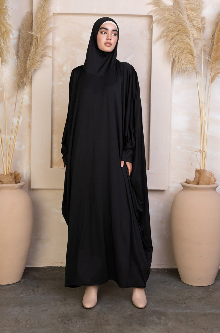 Black loose-fitting abaya with hijab, perfect for Salah outfit in breathable material