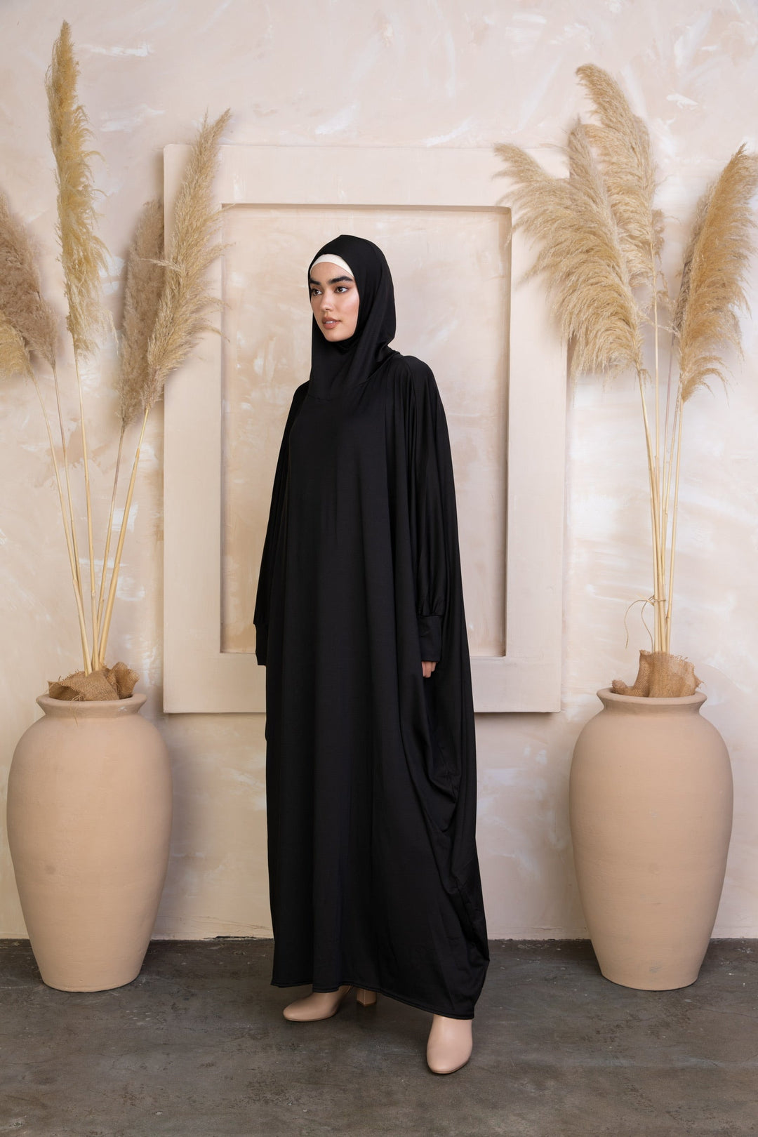 Black Hooded Abaya in One Piece Salah Prayer Outfit made of breathable material