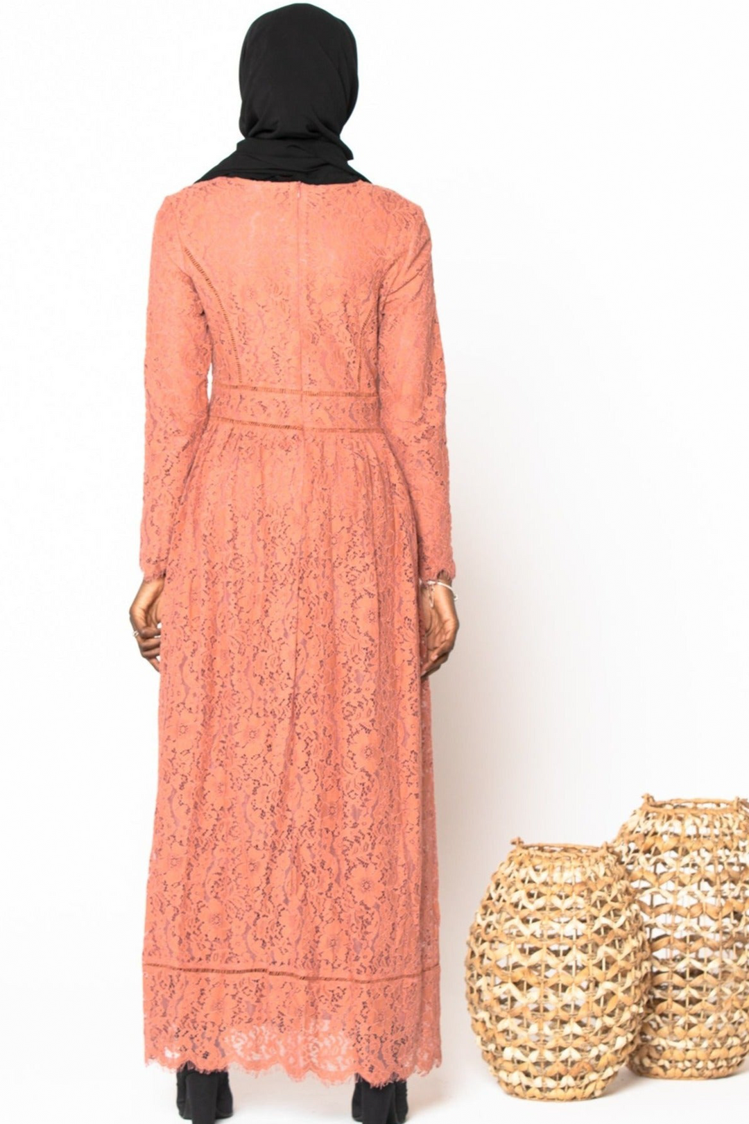 Coral Zahra Lace Long Sleeve Maxi Gown with guipure lace and zipper closure, paired with black hijab