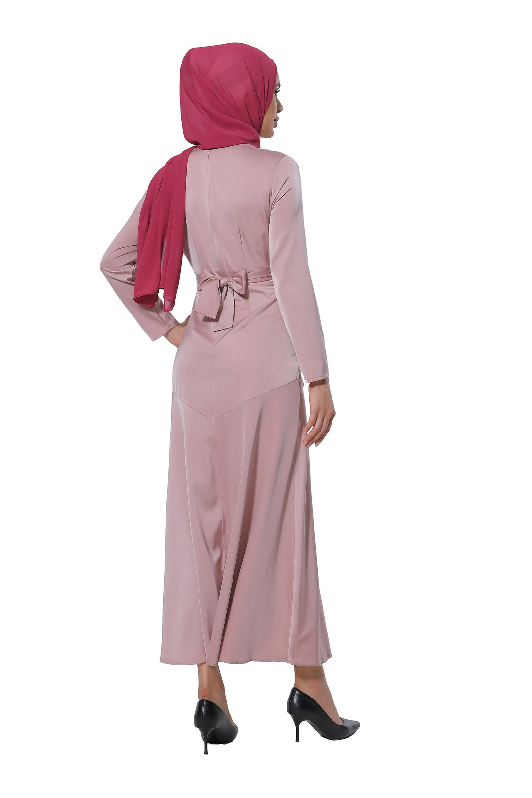 Woman in a pink hijab wearing a pink criss cross satin long sleeve maxi dress