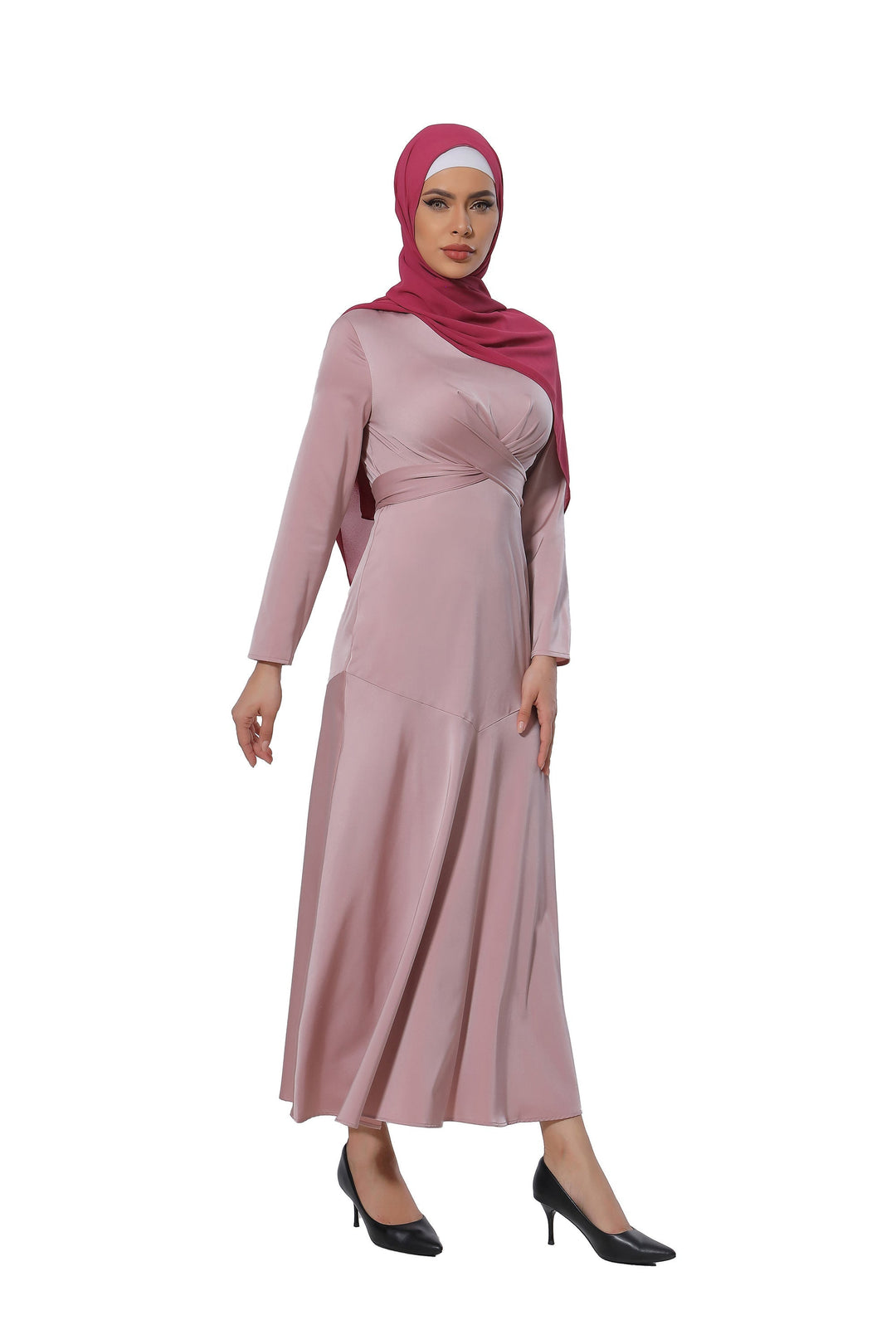 Woman in a pink criss cross satin long sleeve maxi dress with hijab, stylish clearance look