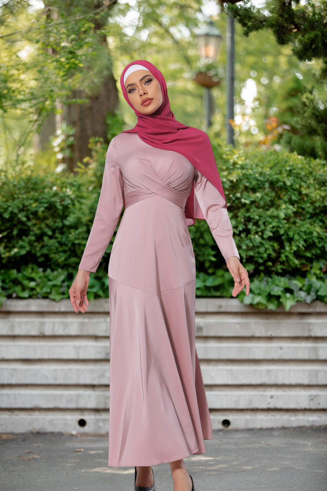 Woman in a Pink Criss Cross Satin Long Sleeve Maxi Dress with Maroon Hijab