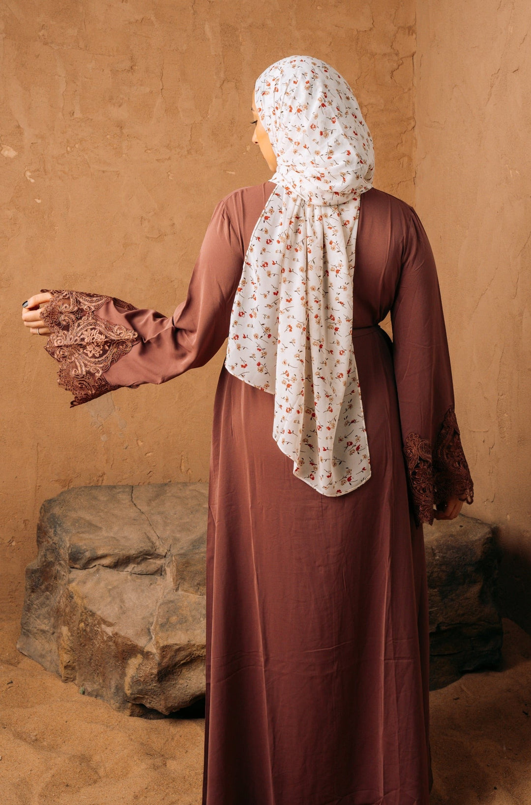 Woman in a brown dress and floral hijab modeling a Purple Lace Sleeve Zipper Abaya Dress