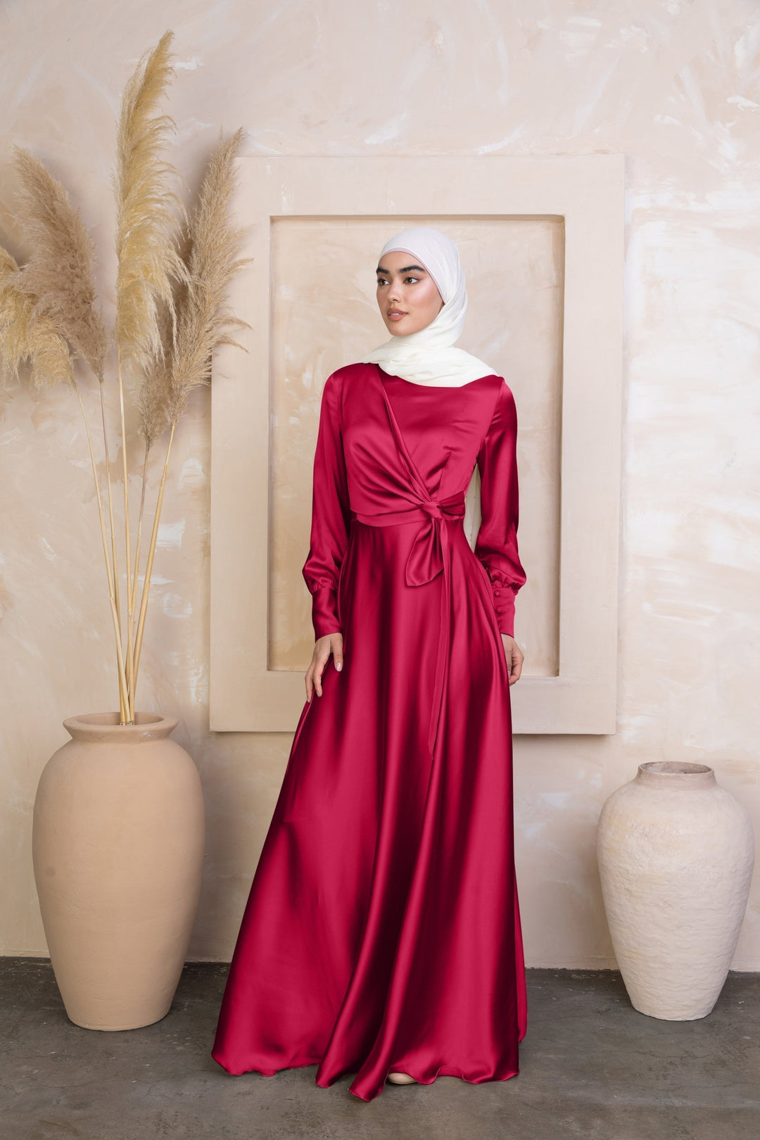 Long-sleeved red satin dress showcasing the Red Diana Side Knot Satin Gown design