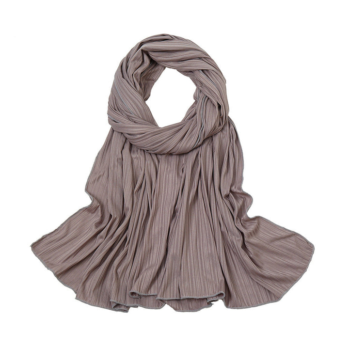 Pleated taupe ribbed jersey scarf showcasing elegant ribbed texture for versatile styling