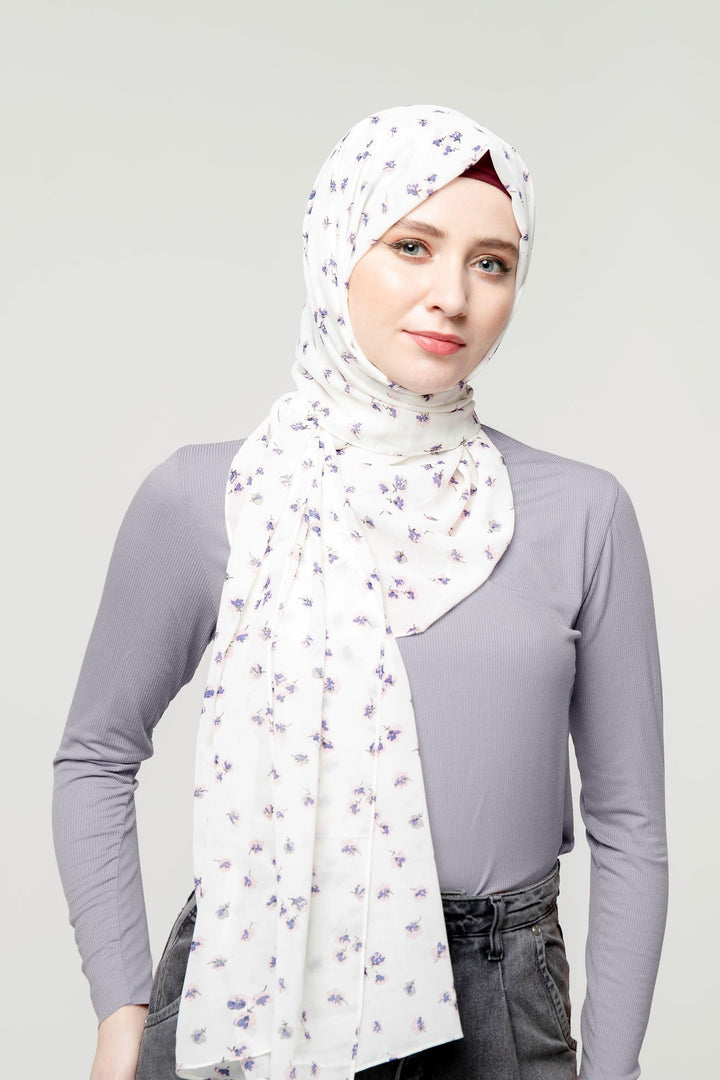 Floral patterned hijab styled with a Ribbed Turtleneck Long Sleeve Sweater in premium jersey