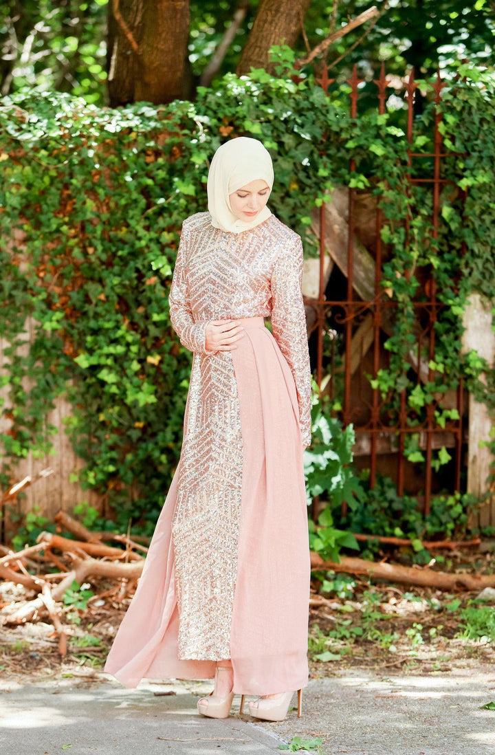 Elegant woman in a hijab wearing a Rose Gold Chevron Sequin Gown showcasing urban modesty