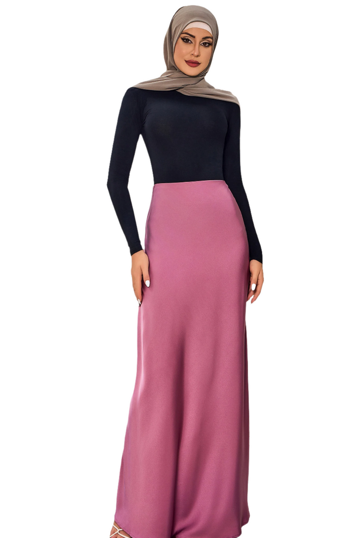 Woman in black top and mauve Rosie Satin Maxi Skirt styled with hijab