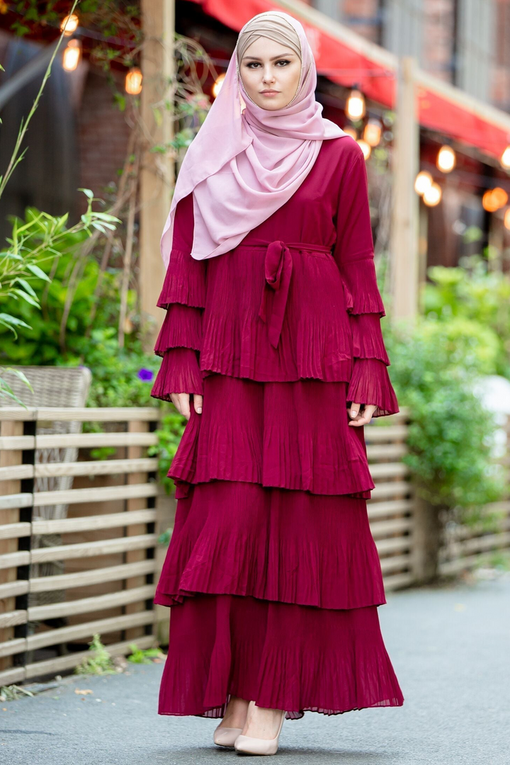 Burgundy tiered pleated dress with hijab and pink rhinestone trim chiffon details