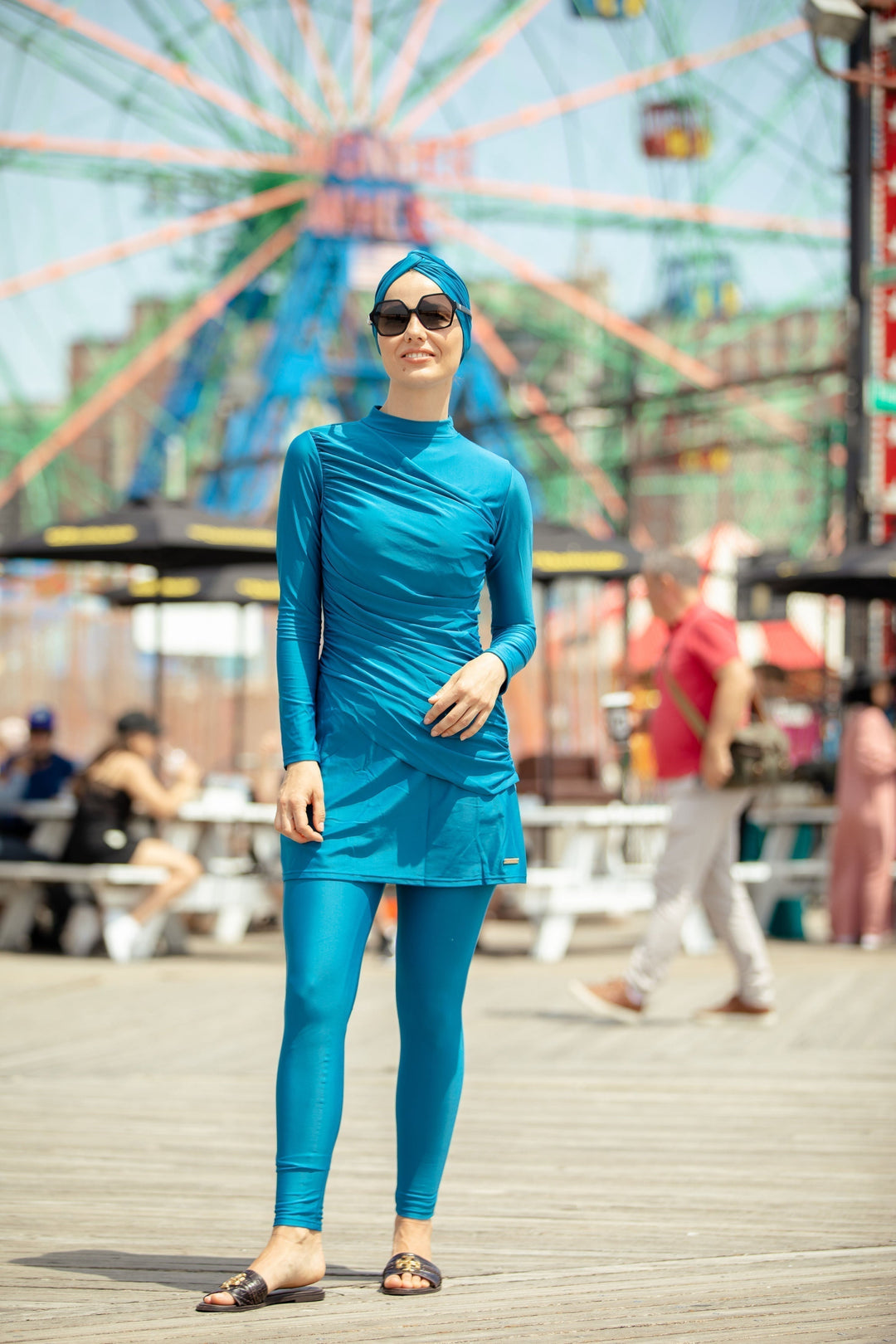 Woman in blue burkini wearing Ruched 3 Piece Modest Swimsuit on clearance sale