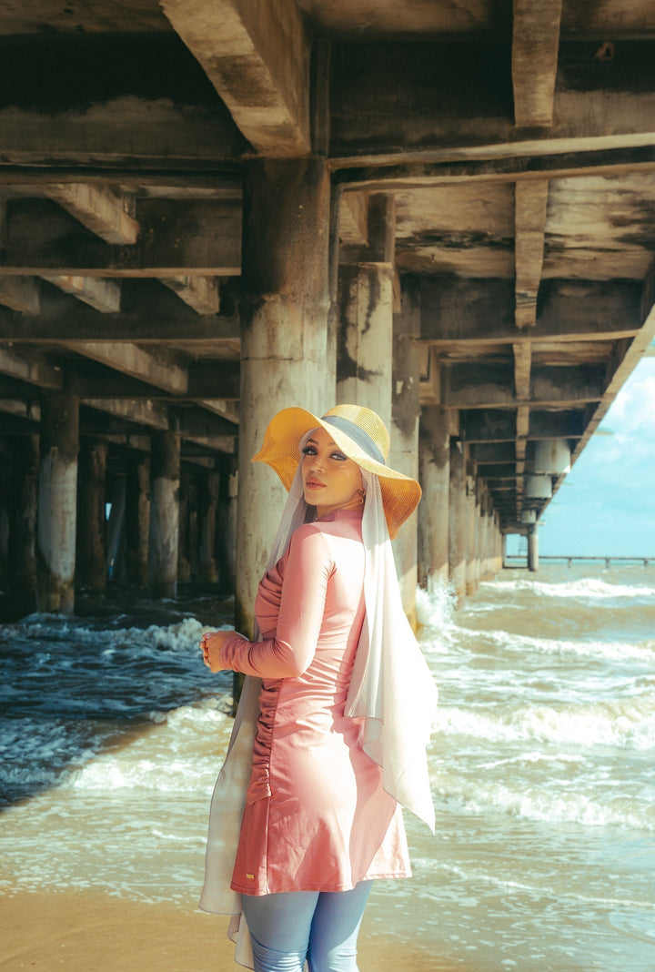 Woman in modest swimsuit with sun hat, showcasing Ruched 3 Piece Modest Swimsuit