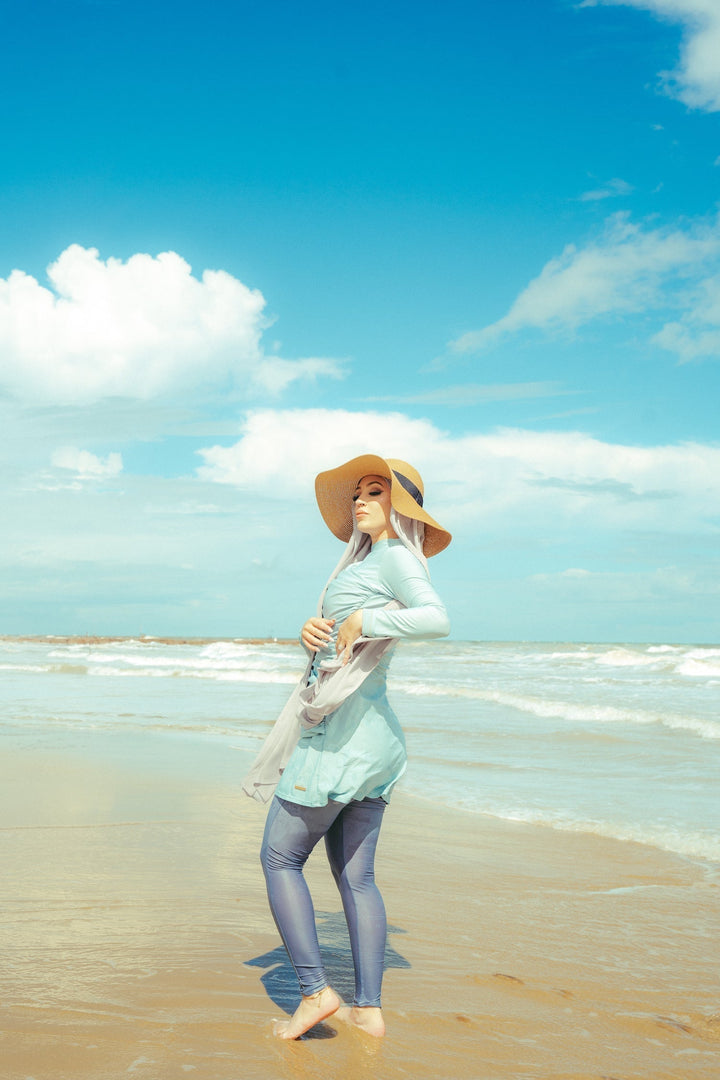 Woman in modest swimsuit and sunhat showcasing Ruched 3 Piece Modest Swimsuit Clearance