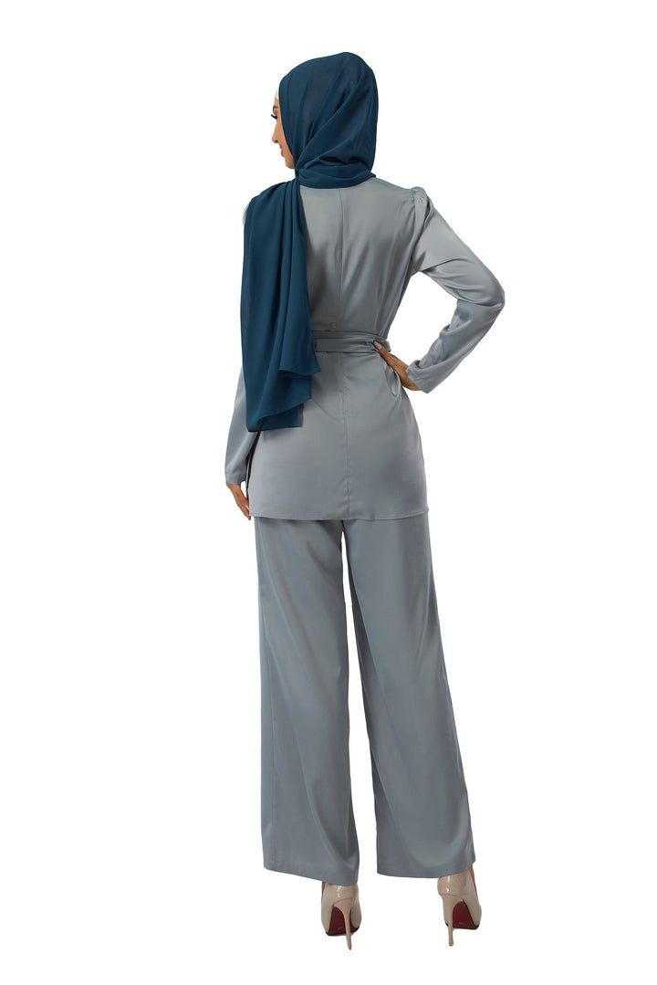 Woman in gray pantsuit and teal hijab showcasing Sage Green Satin Side Wrap Tunic & Pant Set