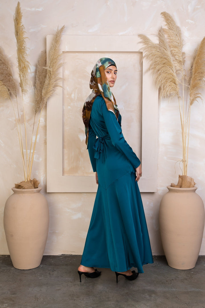 Teal long-sleeved Sapphire Criss Cross Satin Maxi Dress with patterned hijab