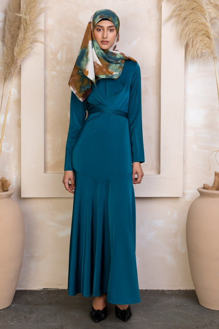 Teal long-sleeved Sapphire Criss Cross Satin Maxi Dress with patterned hijab