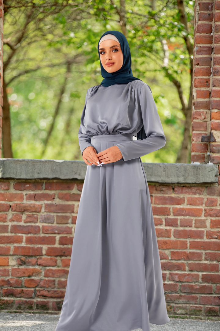 Elegant gray Satin Pleated Maxi Dress paired with a dark green hijab for stylish modesty