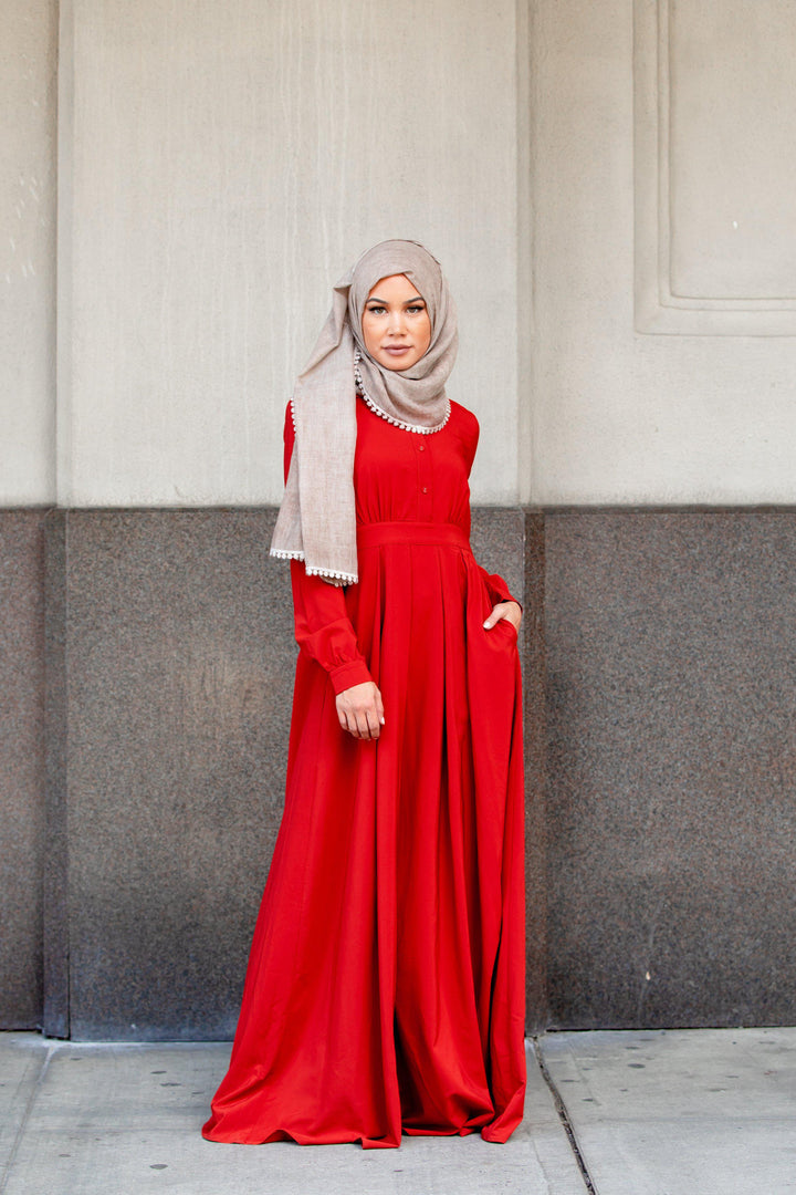 Red long-sleeved Scarlett Lattice Abaya Maxi Dress with zipper closure and hijab