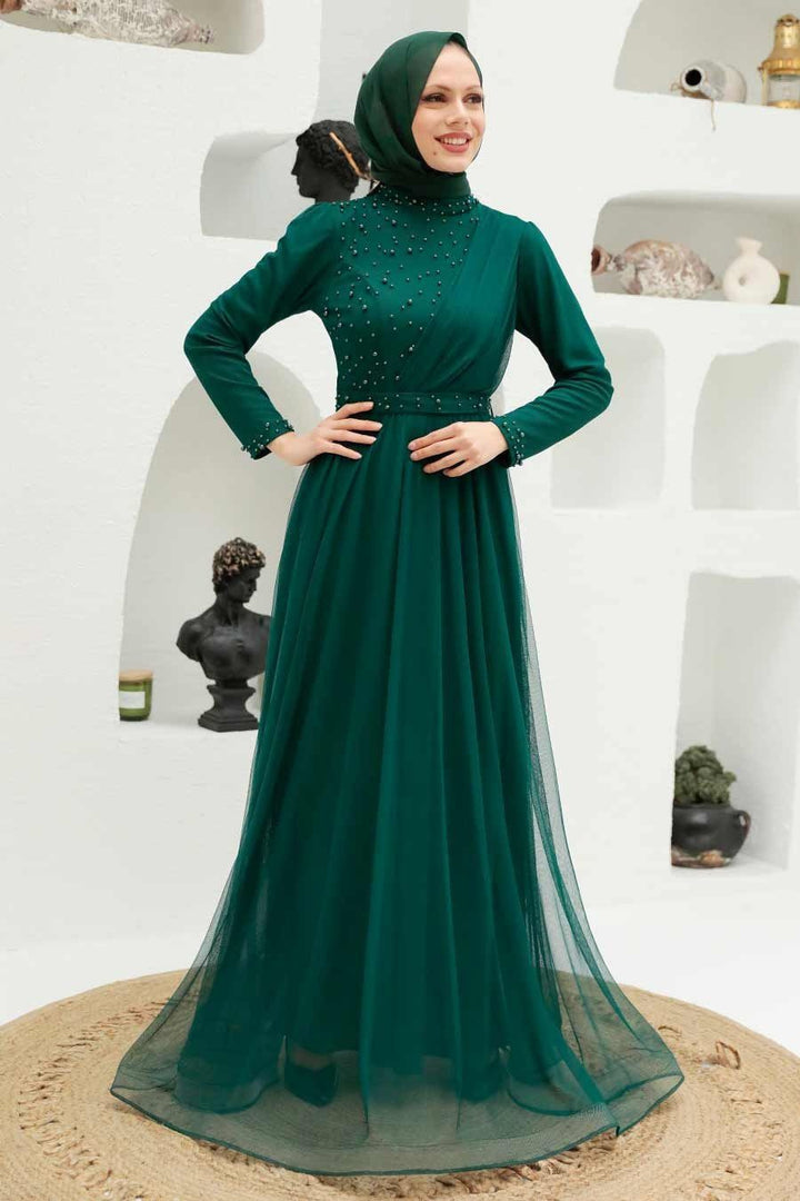 Emerald green modest dress featuring elegant details of the Side Pearl Gown maxi dress