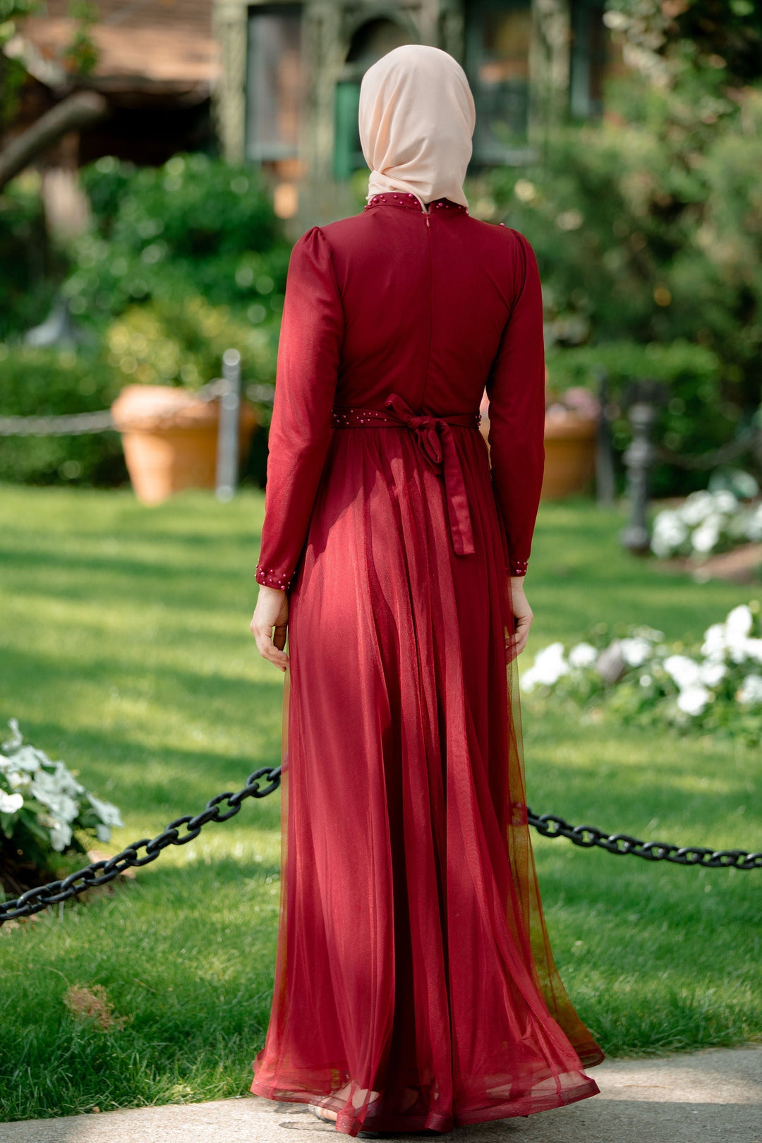 Burgundy long-sleeved pearl gown with hijab, perfect maxi dress for elegant occasions