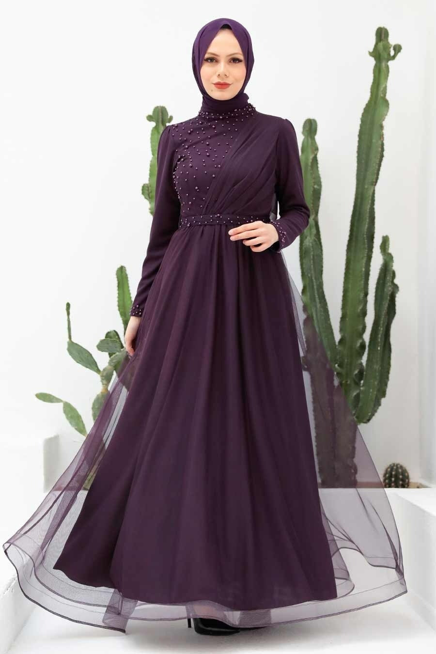 Elegant Plum Pearl Gown featuring long sleeves and beaded accents for a stunning look