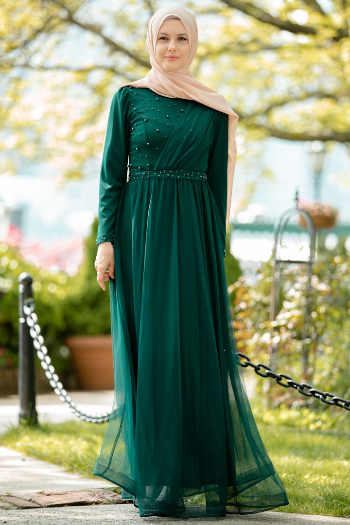 Elegant green maxi dress with hijab, showcasing the stylish Side Pearl Gown