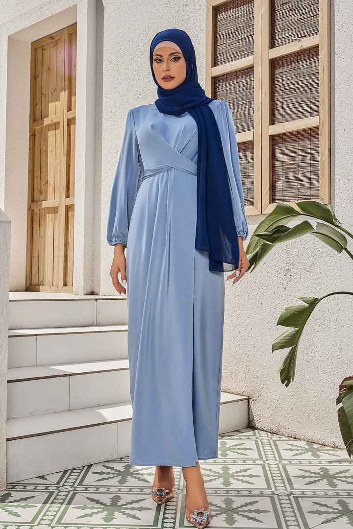 Woman in blue modest dress and hijab wearing Silver Criss Cross Satin Maxi Dress