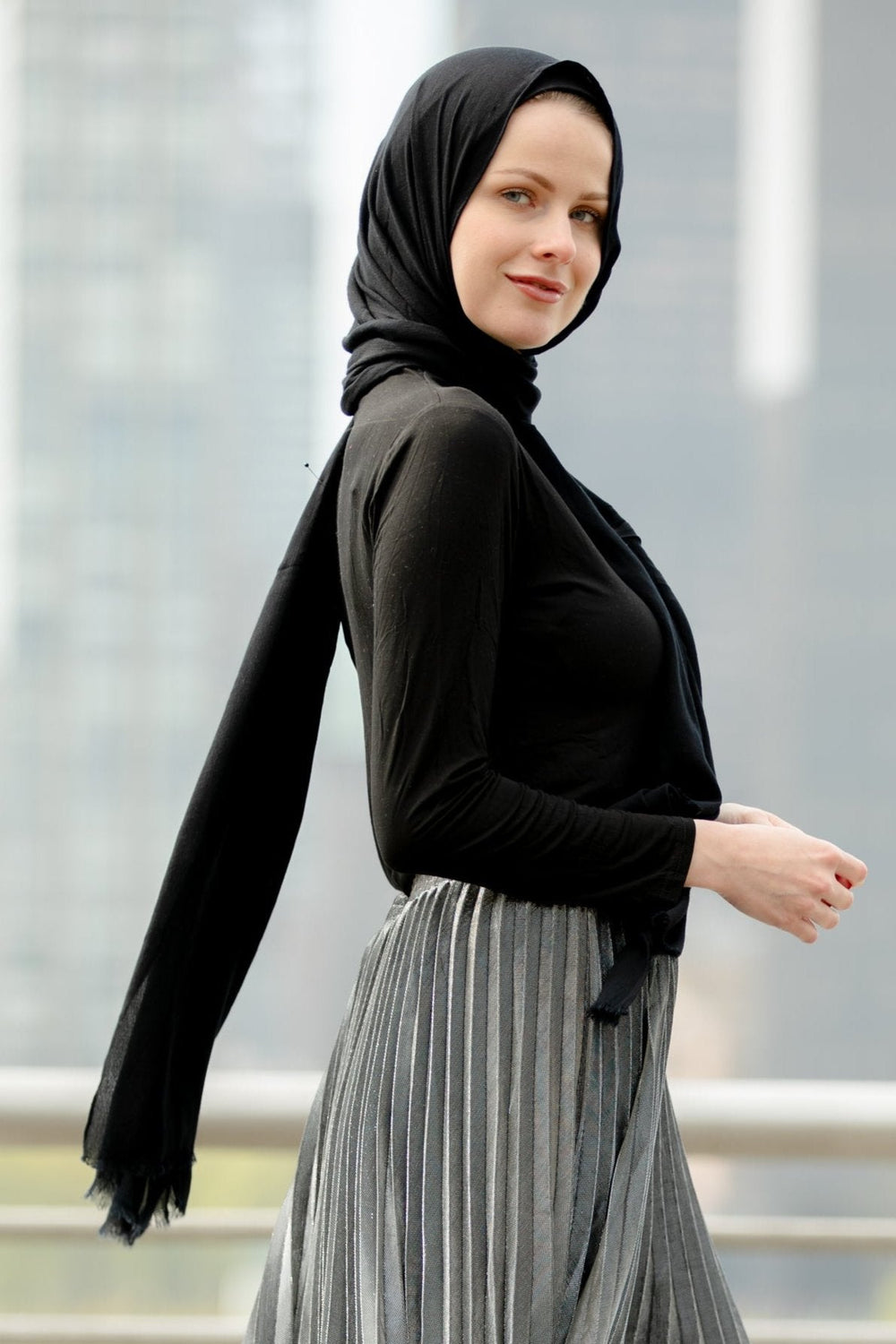 Woman in black hijab wearing Silver Metallic Pleated Chiffon Maxi Skirt on clearance