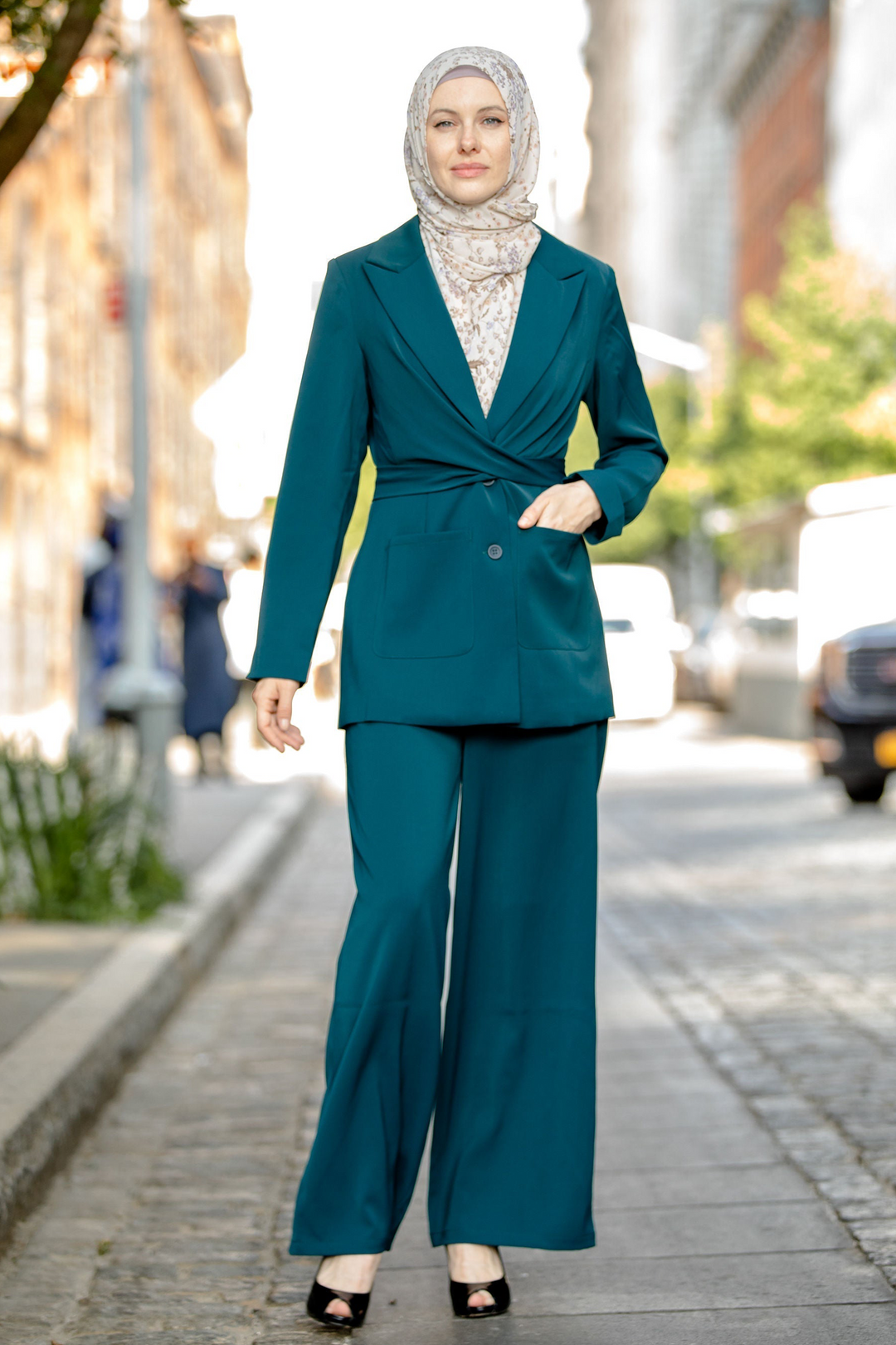 Woman in teal pantsuit and hijab modeling a stylish Teal Jacket and Pants Suit Set