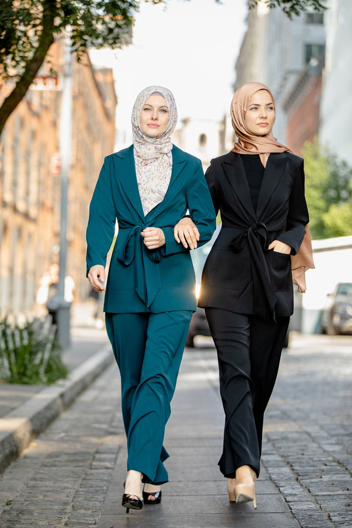 Two women in stylish modest teal jacket and pants suit set on clearance