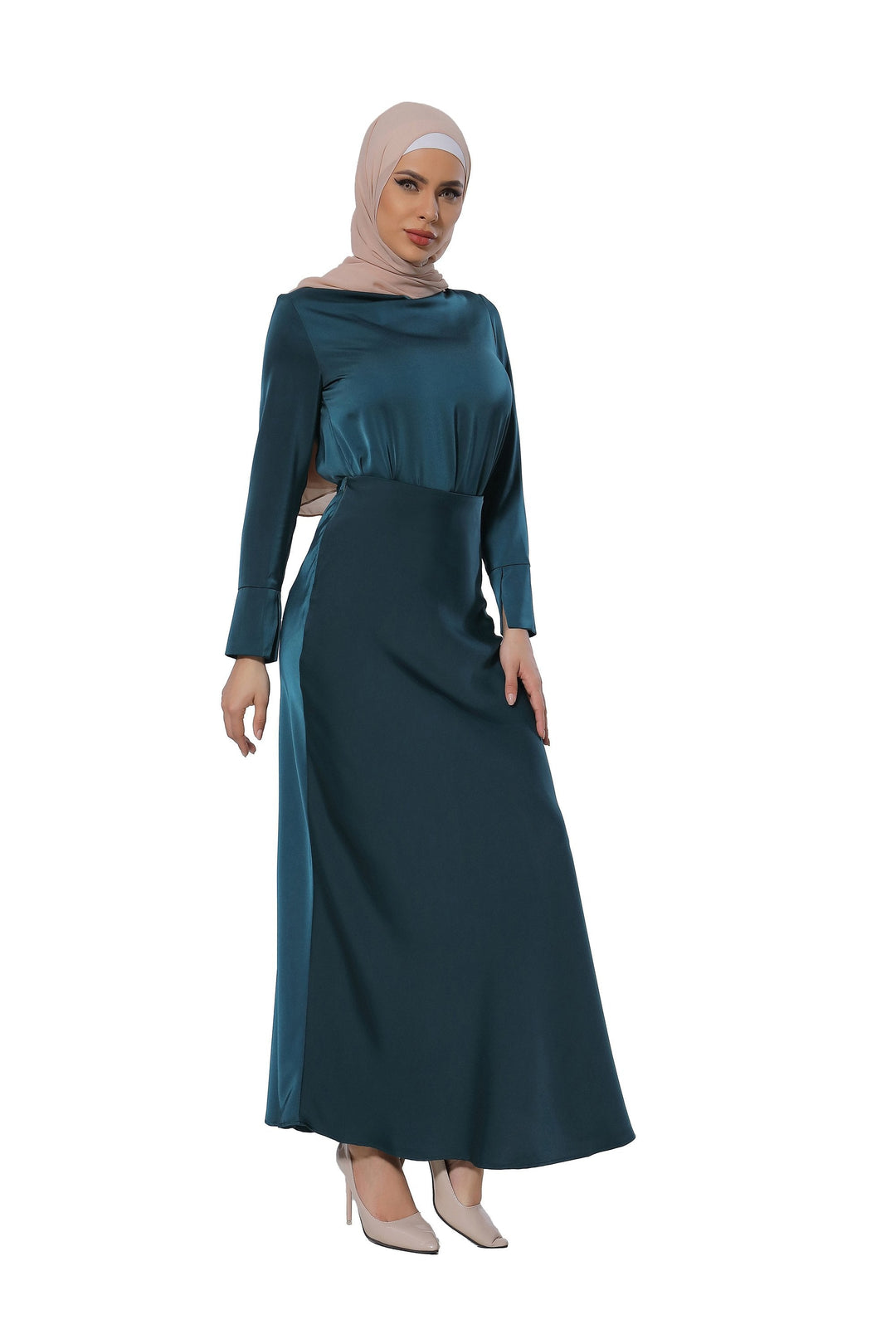 Woman in a teal satin long sleeve skirt set with stylish hijab