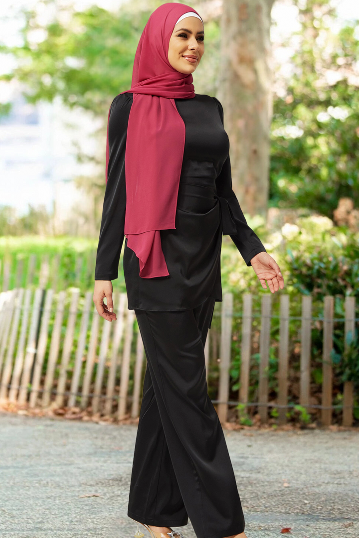 Woman in black satin pantsuit with magenta hijab, clearance set