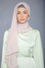 Woman in Latte Chiffon Hijab and light green dress