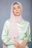 Woman in Latte Chiffon Hijab and light green satin blouse