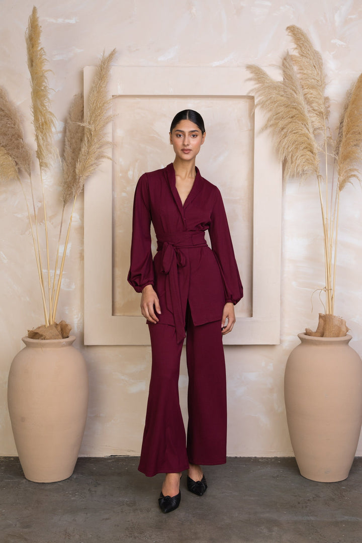Burgundy belted pantsuit in maroon ribbed tunic and pants set