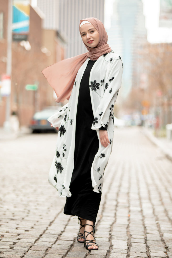 Woman in hijab wearing a Black Embroidered Sheer Midi Cardigan with floral design