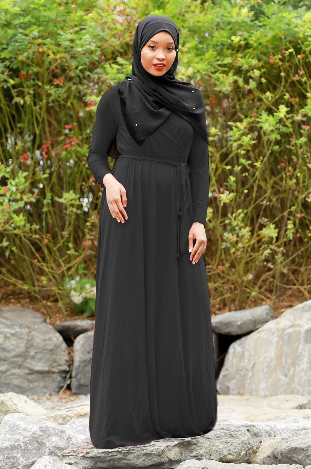 Black modest Wondrous Wrap Maxi Dress with hijab features criss cross neckline in jersey fabric